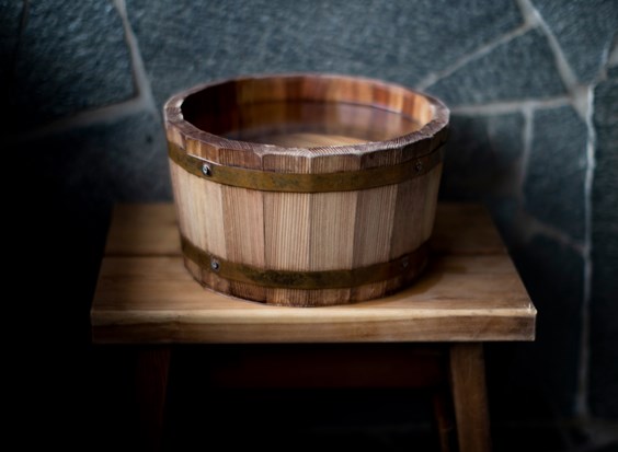 Wooden bucket with water